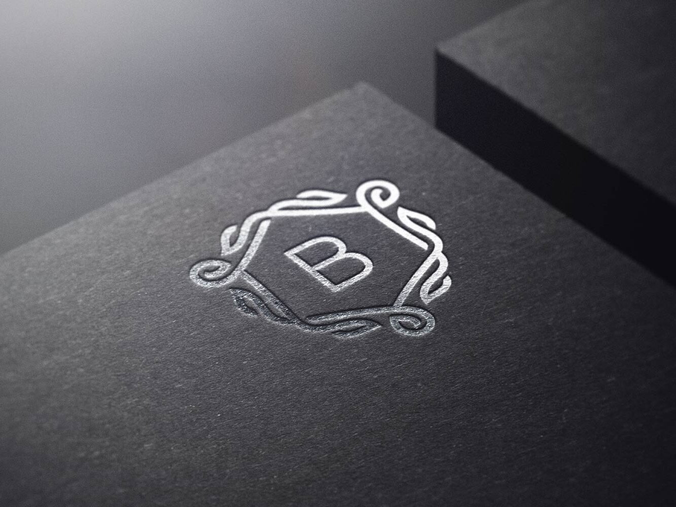 A close up of the letter b on top of a box