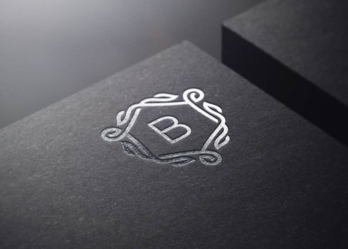 A close up of the letter b on top of a box