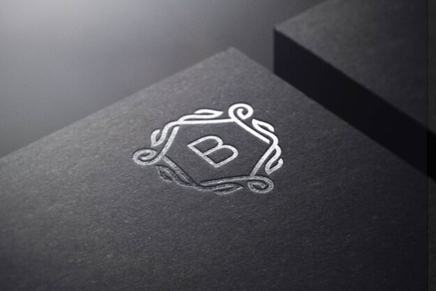 A close up of the letter b on top of a box