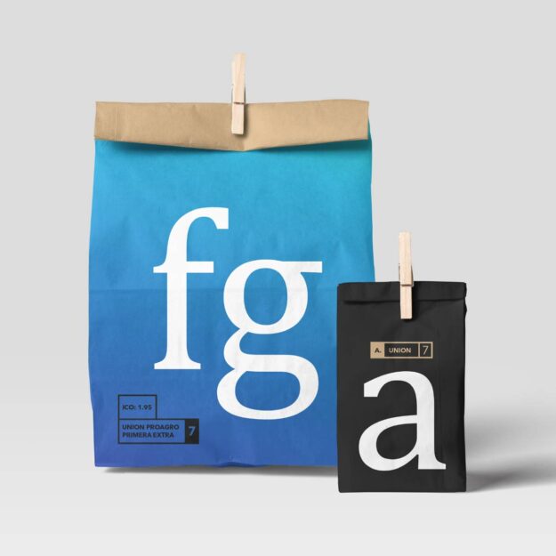 A bag and a candle with the letters f g and a on it