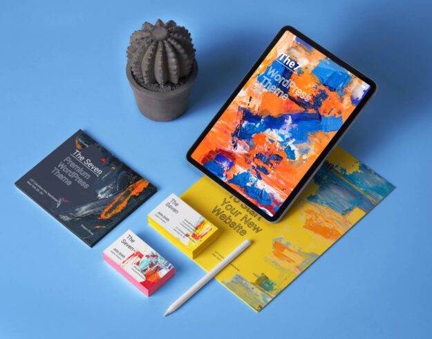 A tablet sitting on top of some papers