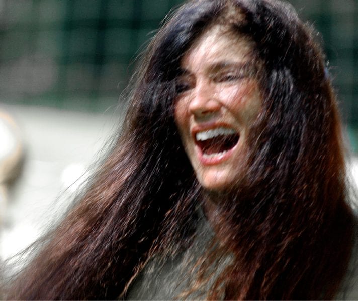 A happy woman with long hair