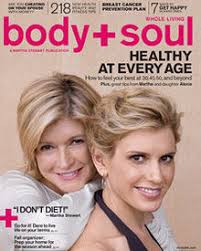 Two women pose for a magazine cover.