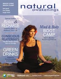 A woman sitting in the lotus position on top of a magazine.