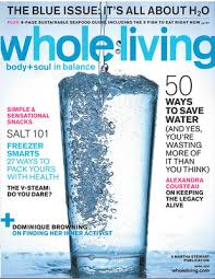 A magazine cover with a glass of water