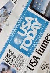 A newspaper with the usa today logo on it.